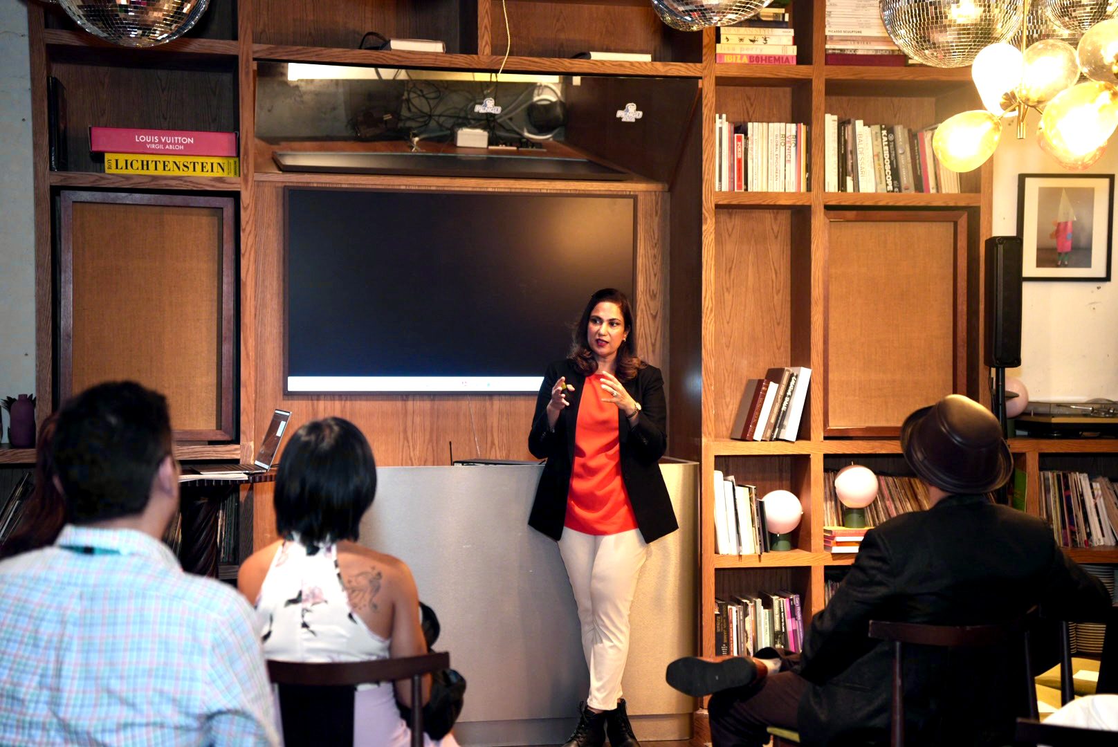Shazaf leading a Single Safety conversation in a room of people