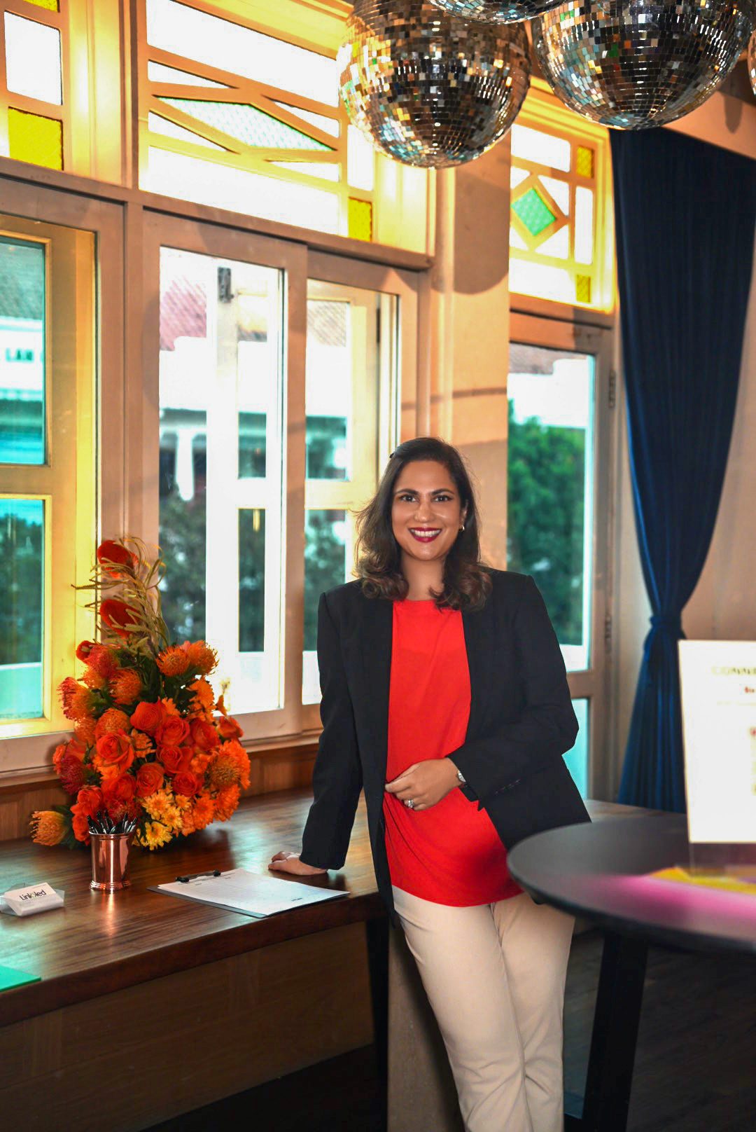 Shazaf Moonis welcoming guests before a Single Safety talk
